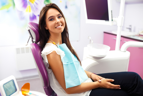 woman at the dentist chair during a dental procedure-img-blog